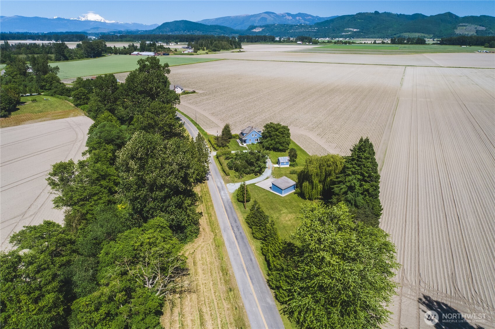 19719 Dry Slough Road Mount Vernon, WA 98273 - Photo 8 of 40 a view of a lake with outdoor space