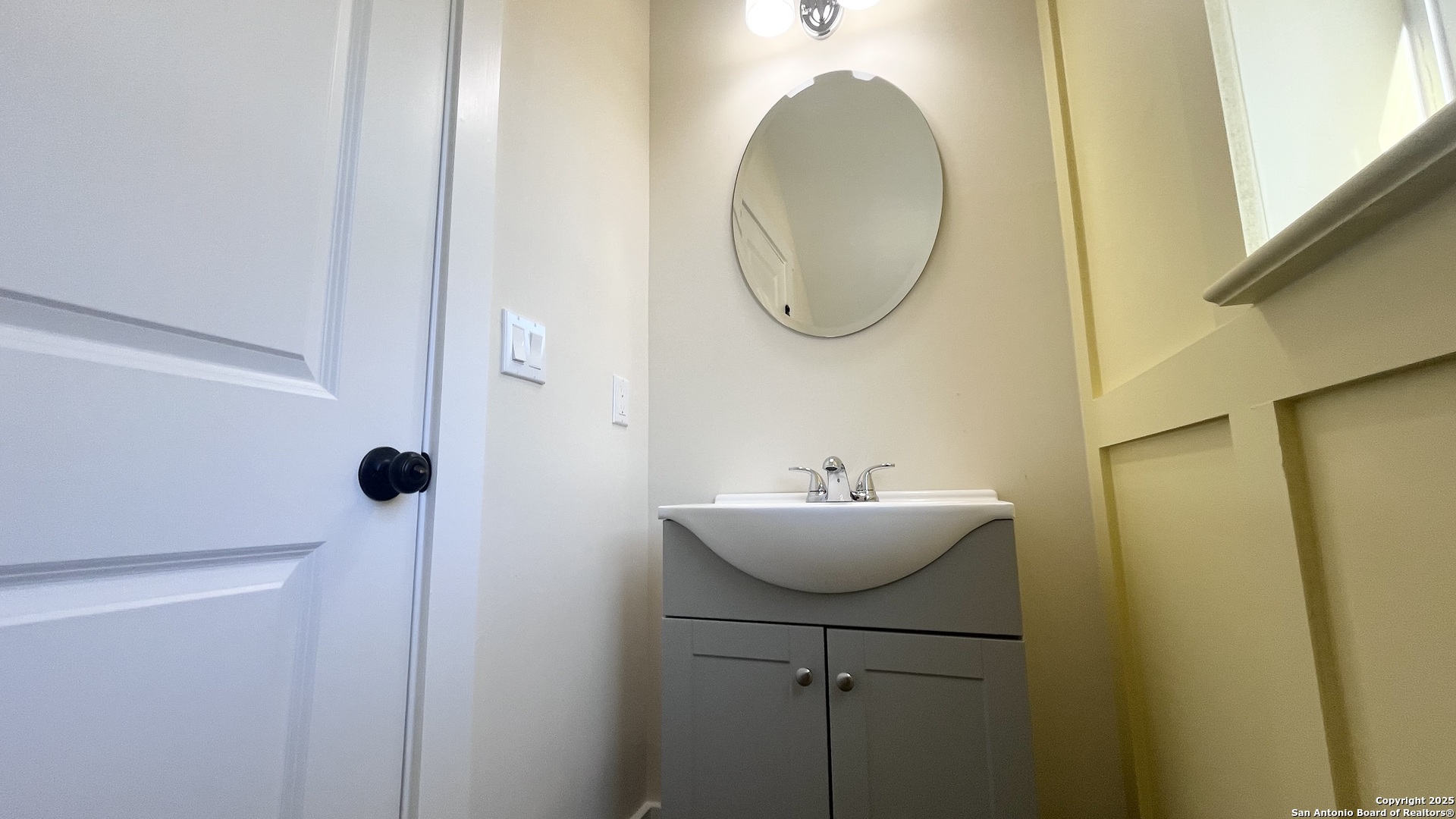 477 Scenic Drive Bandera, TX 78003 - Photo 11 of 22 a bathroom with a sink and a mirror