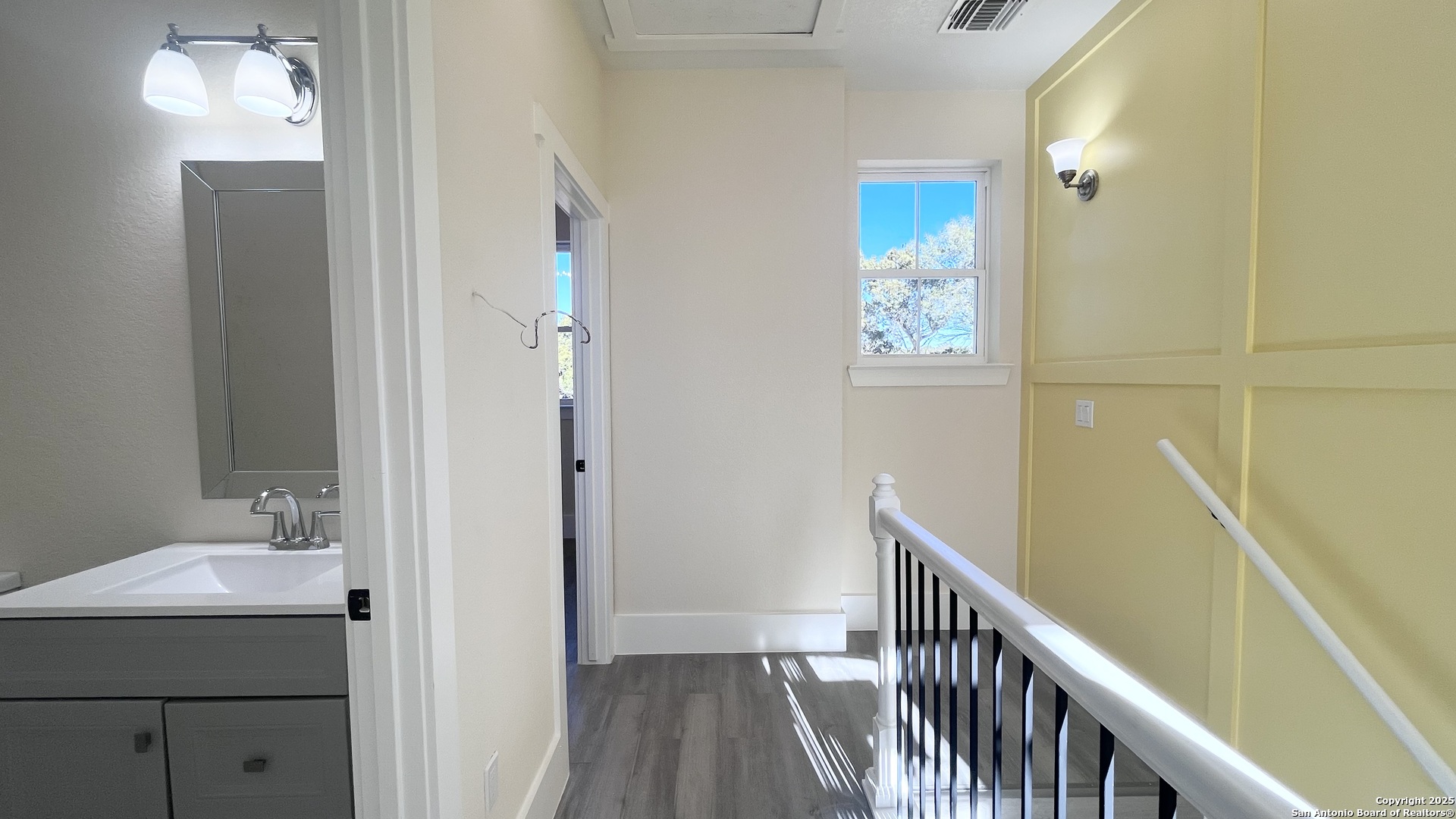 477 Scenic Drive Bandera, TX 78003 - Photo 16 of 22 a view of a bathroom from the hallway