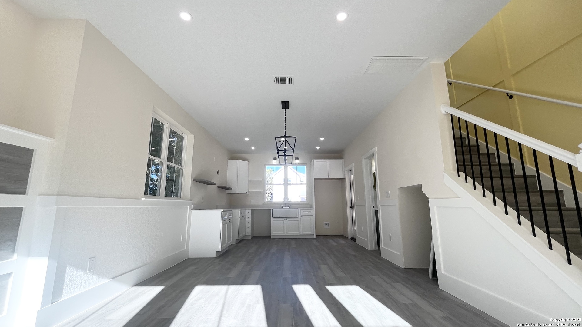 477 Scenic Drive Bandera, TX 78003 - Photo 5 of 22 a view of a kitchen with wooden floor and electronic appliances