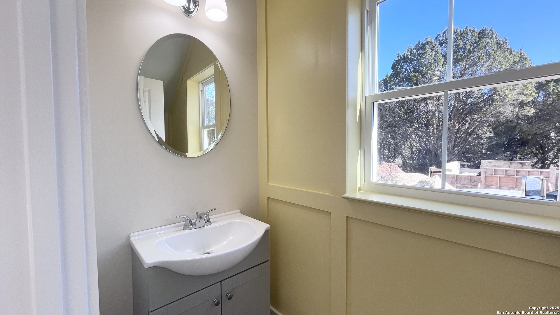 477 Scenic Drive Bandera, TX 78003 - Photo 10 of 22 a bathroom with a sink and a mirror