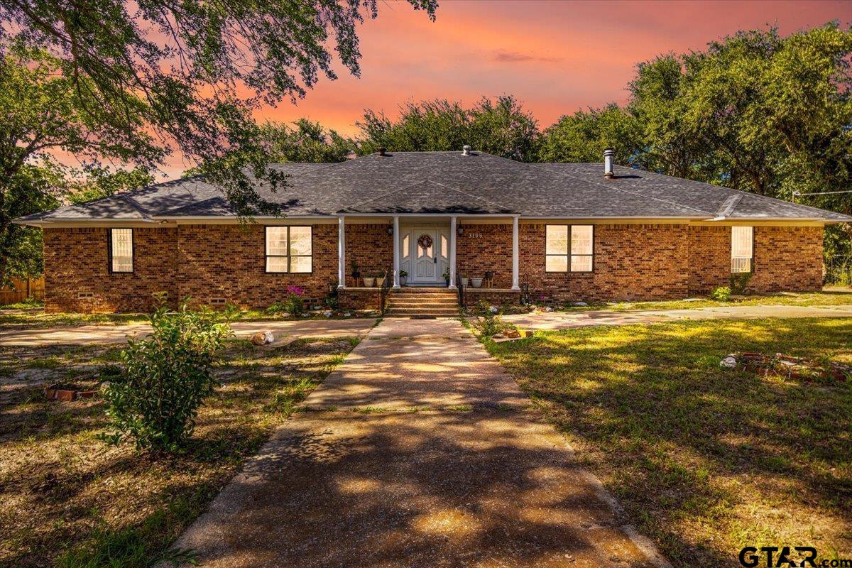 3109 West Shaw Street Tyler, TX 75701 - Photo 2 of 27 a view of a house with a yard