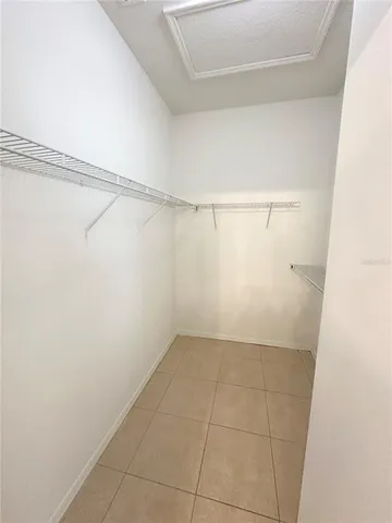 a view of an empty walk in closet