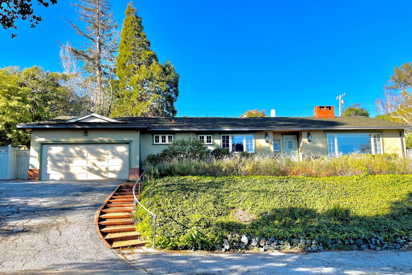 455 El Centro Road Hillsborough, CA 94010 - Photo 1 of 1 a front view of a house with a yard