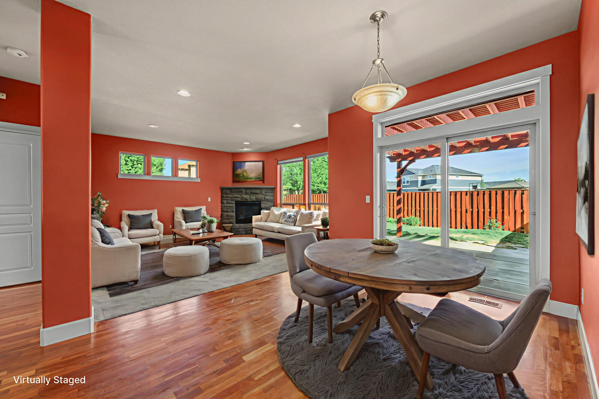 1402 Northeast Hudspeth Road Prineville, OR 97754 - Photo 5 of 36 a dining room with furniture a chandelier and wooden floor