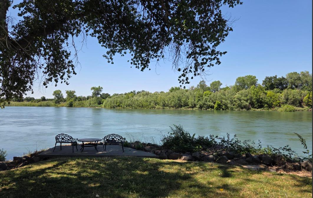 11705 Parey Avenue, Unit 16 Red Bluff, CA 96080 - Photo 12 of 12 a view of a lake with a mountain