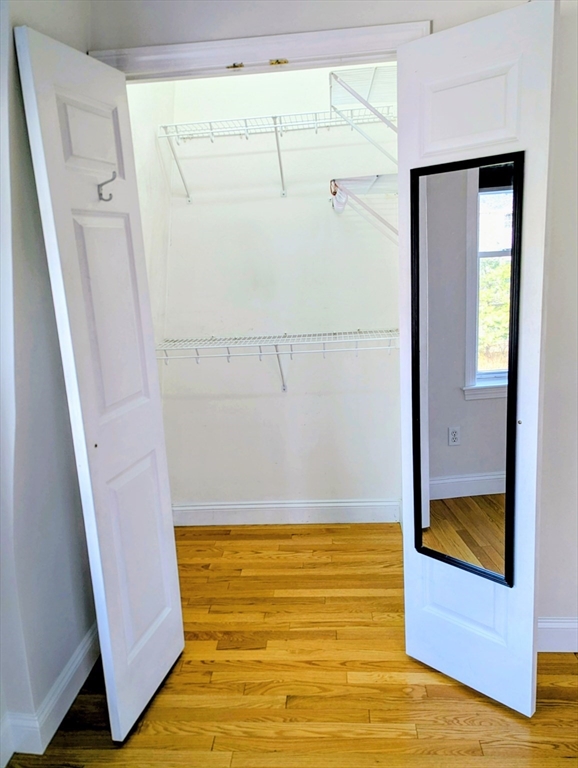 19 Railroad Street, Unit D2 Acton, MA 01720 - Photo 11 of 13 a view of walk in closet with rug