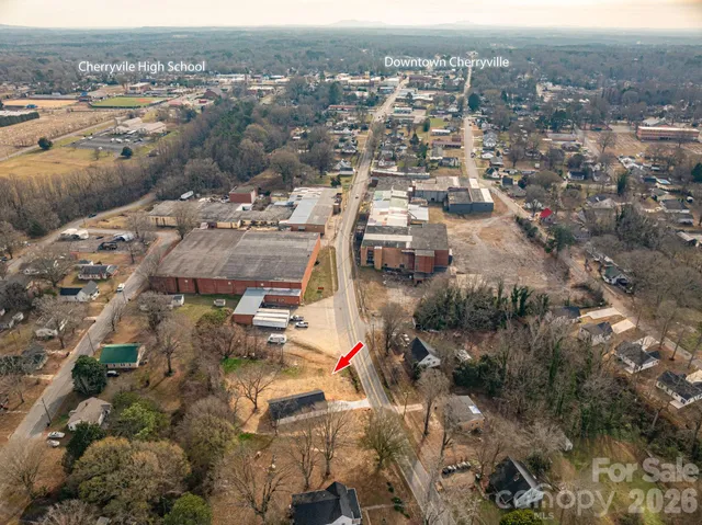 an aerial view of a city with lots of residential buildings