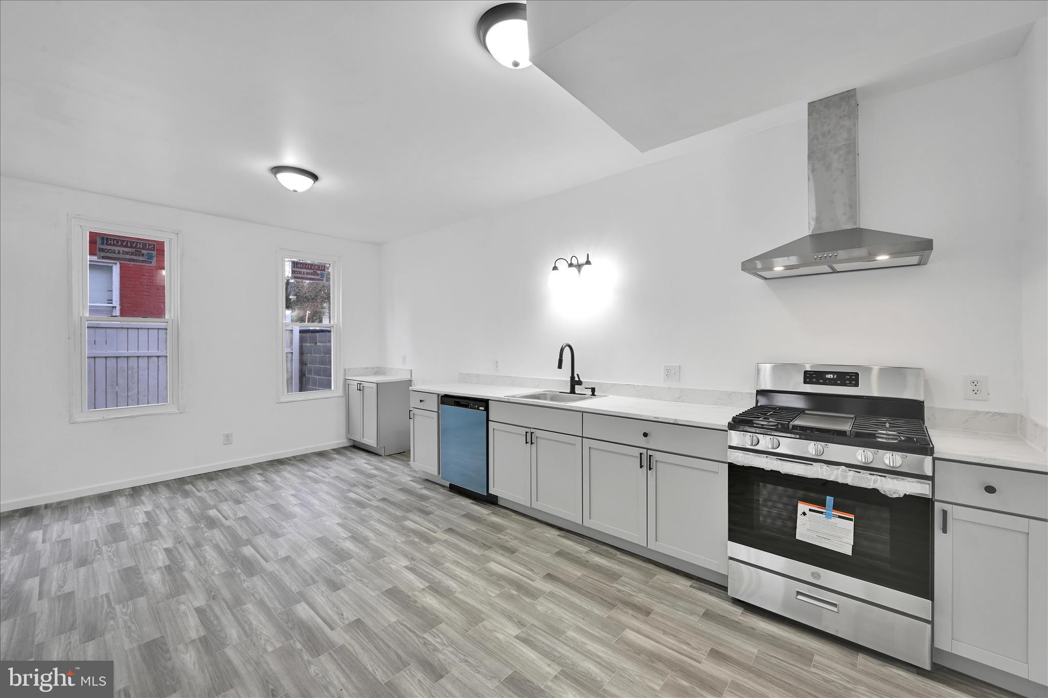132 North West Street York, PA 17401 - Photo 9 of 23 a kitchen with a stove and a sink