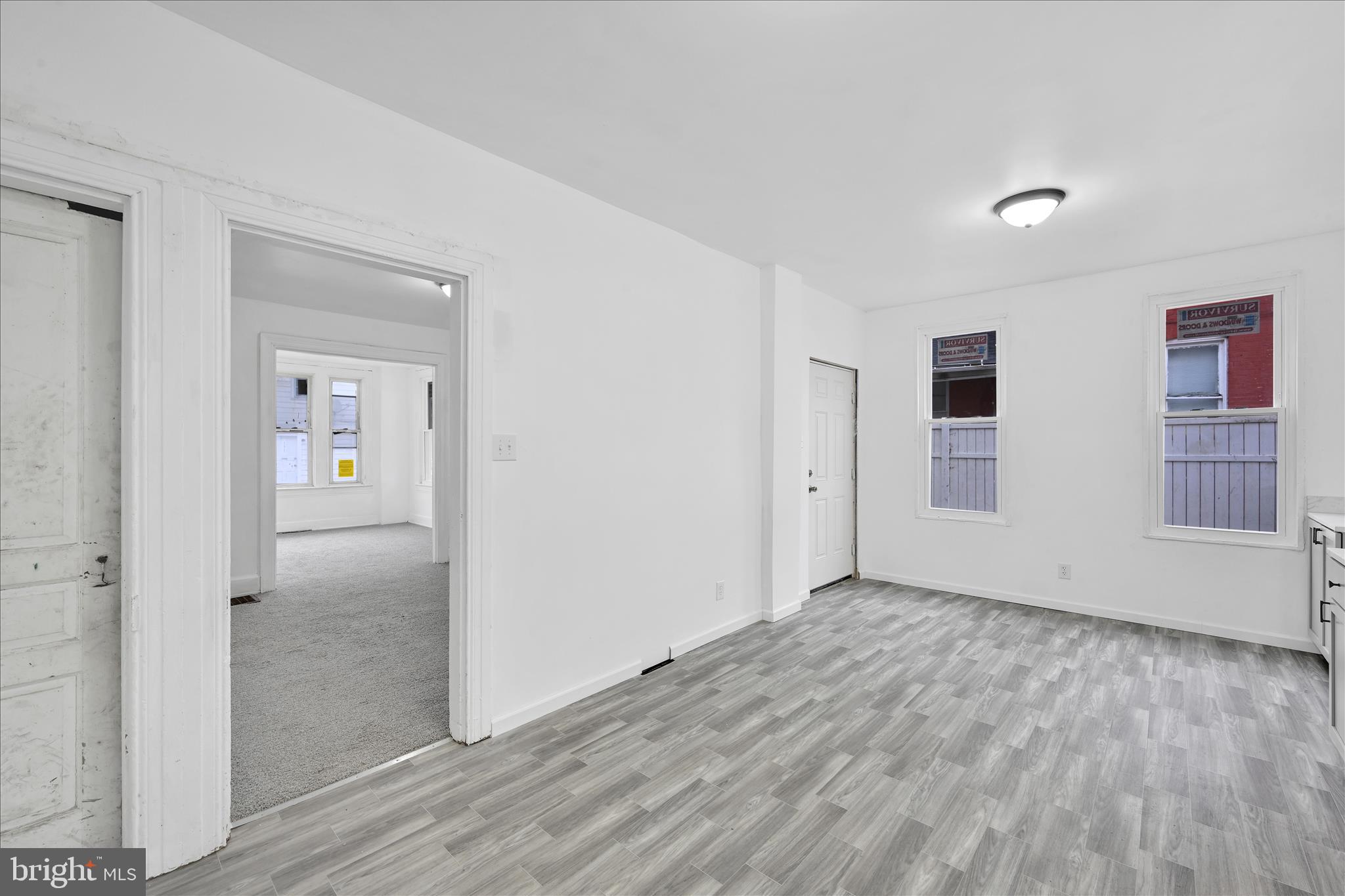 132 North West Street York, PA 17401 - Photo 10 of 23 wooden floor in an empty room with a window