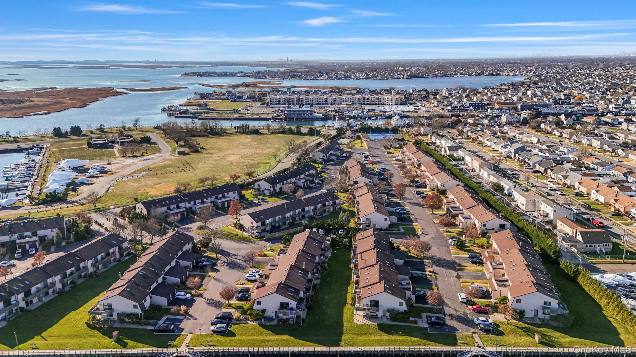 1 Anchorage Way, Unit 101 Freeport, NY 11520 - Photo 26 of 31 an aerial view of residential building and ocean