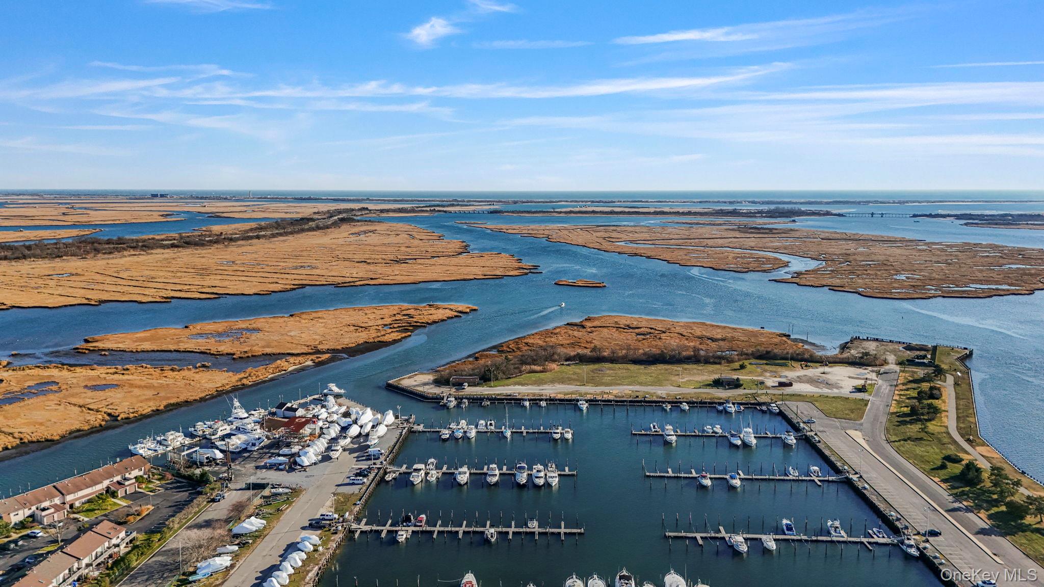 1 Anchorage Way, Unit 101 Freeport, NY 11520 - Photo 31 of 31 a view of an ocean and beach