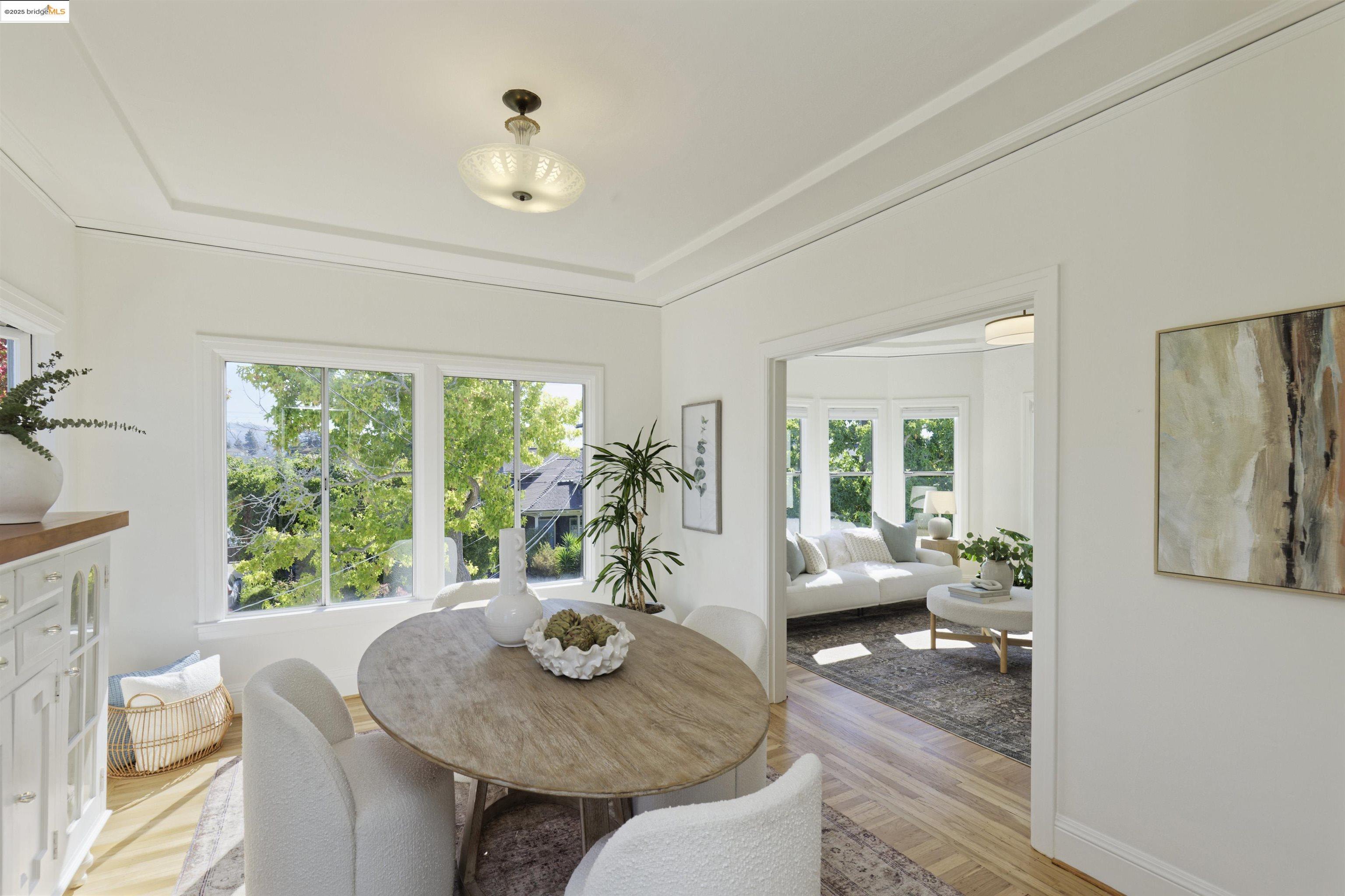 3945 Randolph Avenue, Unit 2 Oakland, CA 94602 - Photo 12 of 43 a living room with furniture and a large window