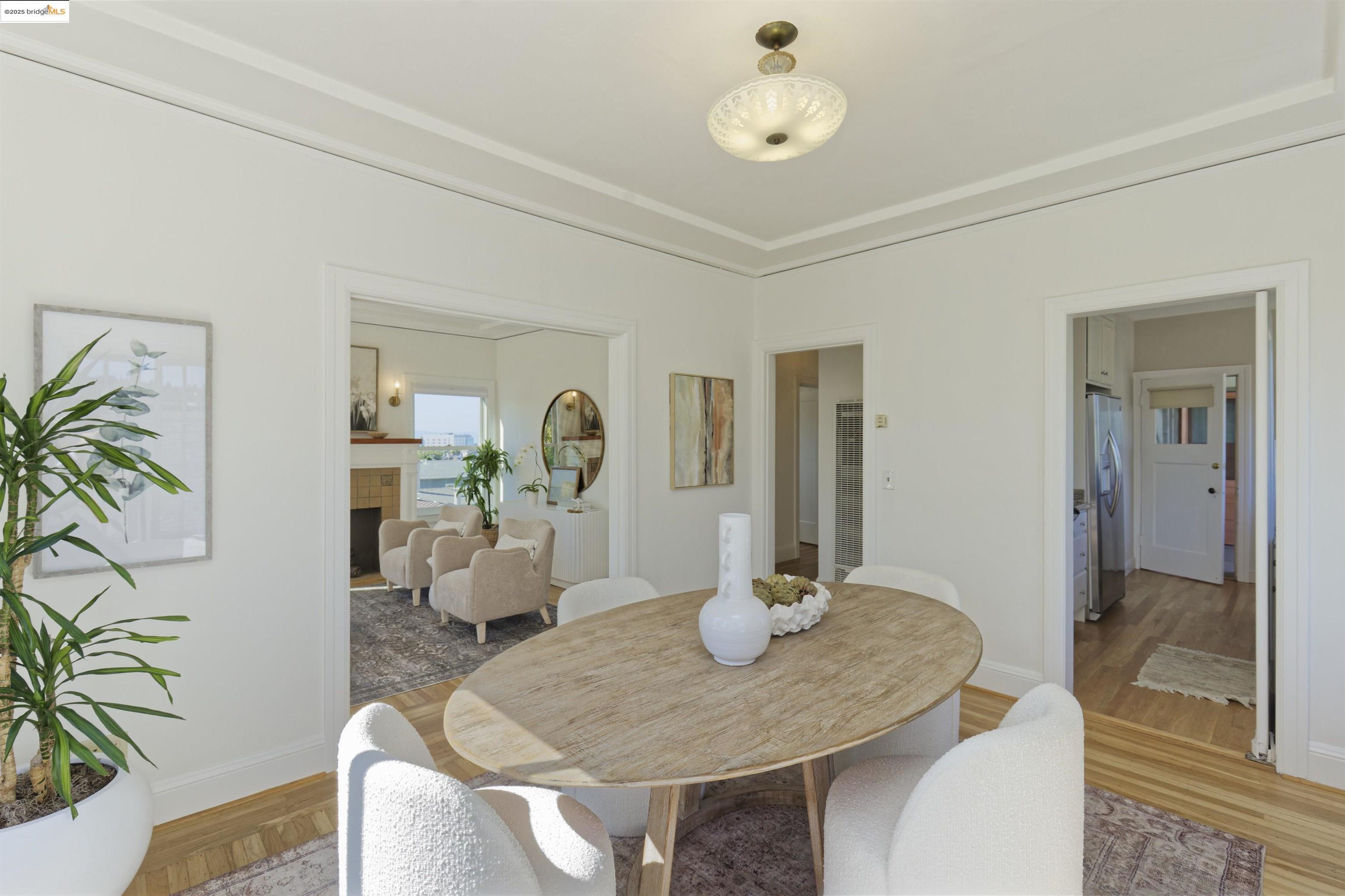 3945 Randolph Avenue, Unit 2 Oakland, CA 94602 - Photo 13 of 43 a dining room with table and chairs