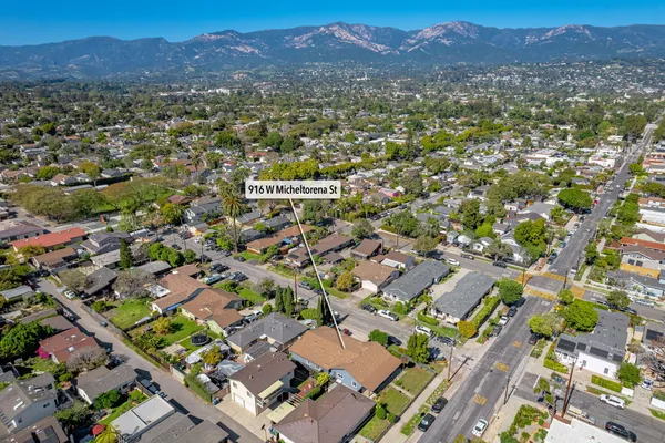 an aerial view of residential house with outdoor space