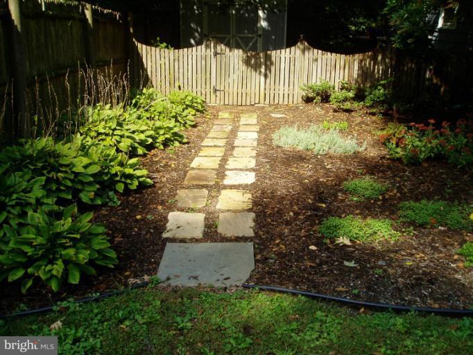 9312 Caroline Avenue Silver Spring, MD 20901 - Photo 13 of 16 Garden Path to Backyard