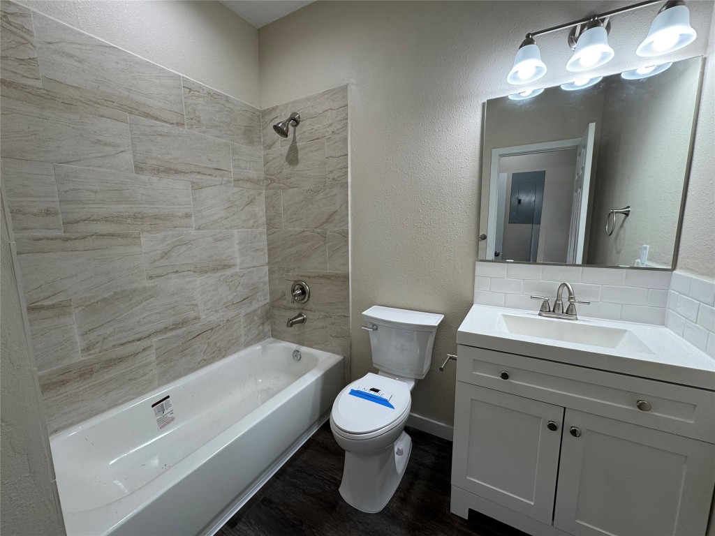 50 Westlake West Trinity, TX 75862 - Photo 13 of 23 a bathroom with a sink toilet a bathtub and a shower