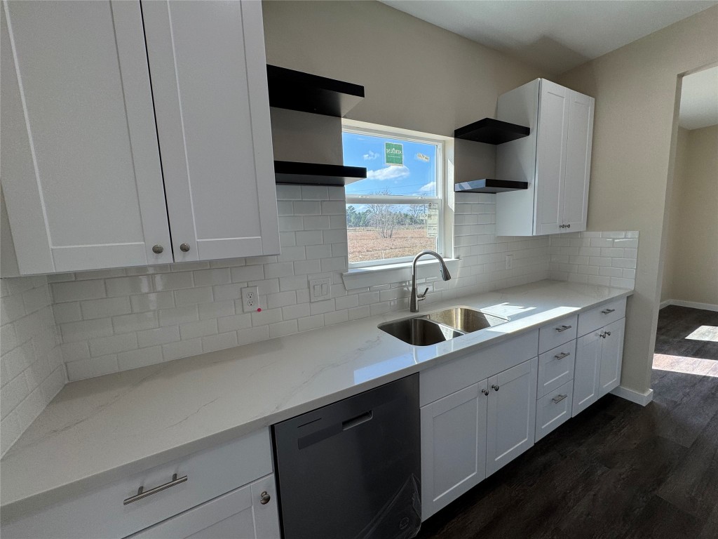 50 Westlake West Trinity, TX 75862 - Photo 7 of 23 a kitchen with a sink and cabinets