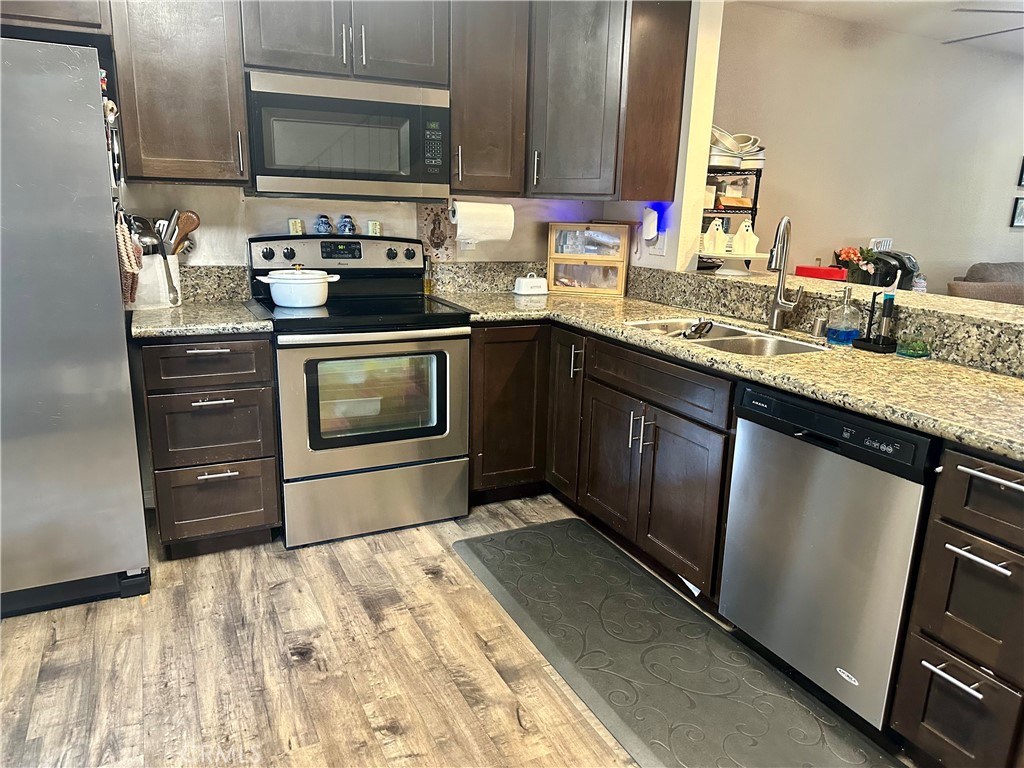a kitchen with a stove and a sink