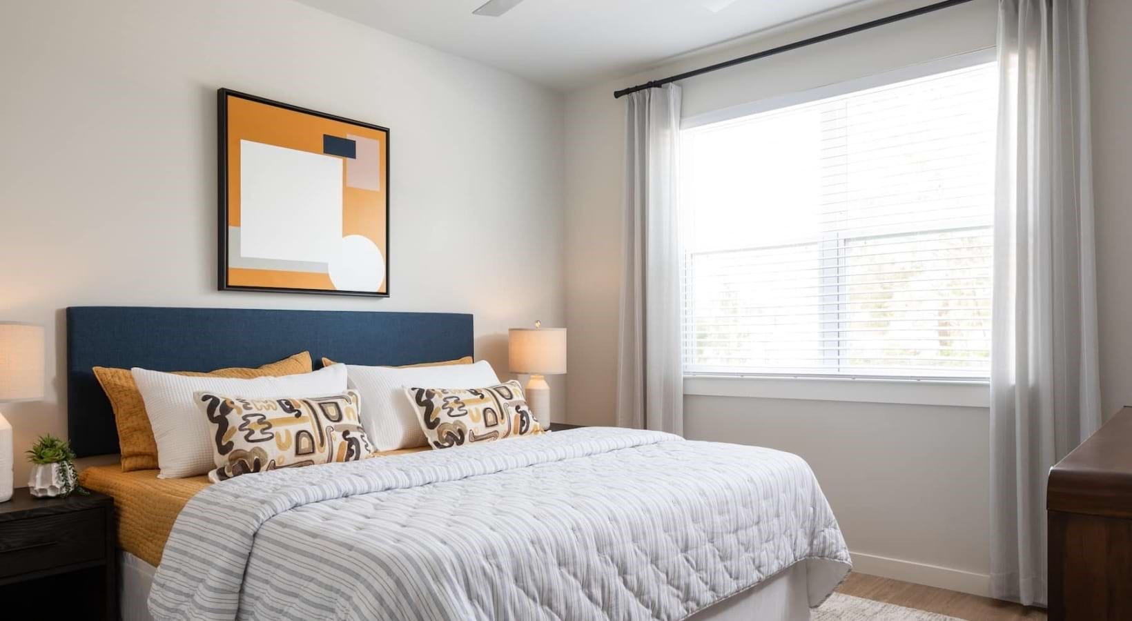 19101 Town Ridge Lane, Unit 4106 Webster, TX 77598 - Photo 5 of 30 a bedroom with a bed and a window