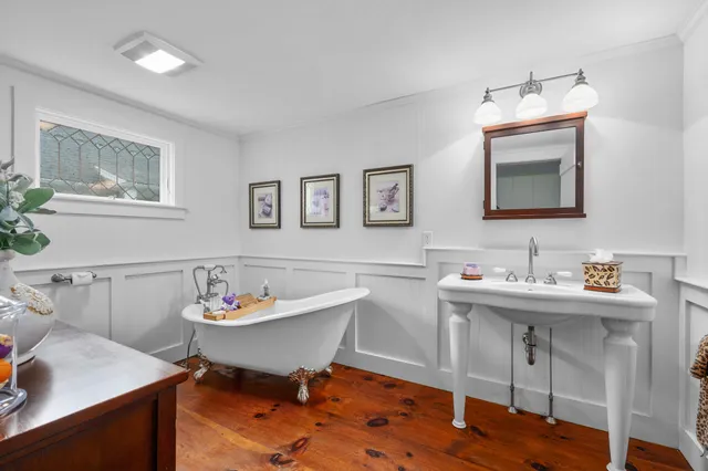 a spacious bedroom with a bed and a couch