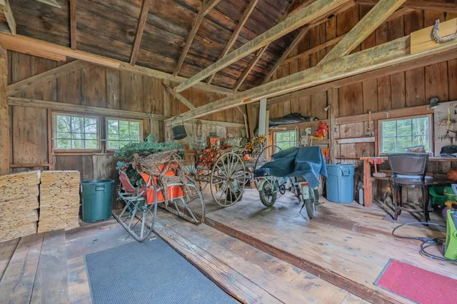 a view of a lake with a house in background
