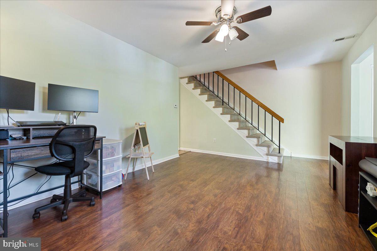 4639 Sands Way Doylestown, PA 18902 - Photo 11 of 32 a view of a workspace with wooden floor and a window