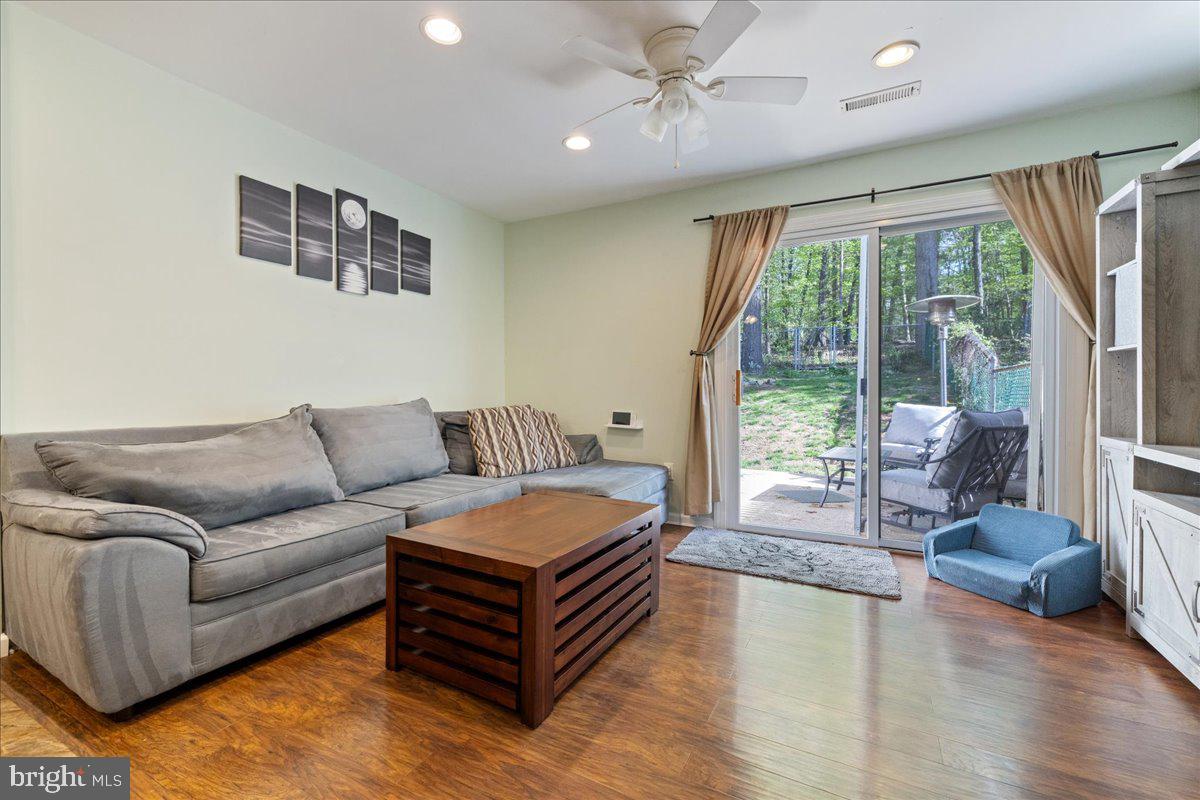 4639 Sands Way Doylestown, PA 18902 - Photo 14 of 32 a living room with furniture and a large window