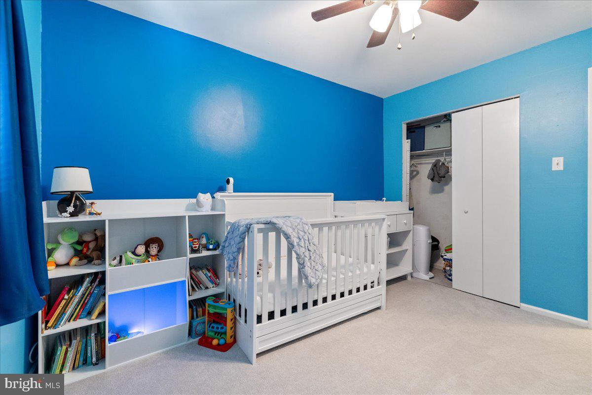 4639 Sands Way Doylestown, PA 18902 - Photo 19 of 32 a bedroom with furniture and a book shelf