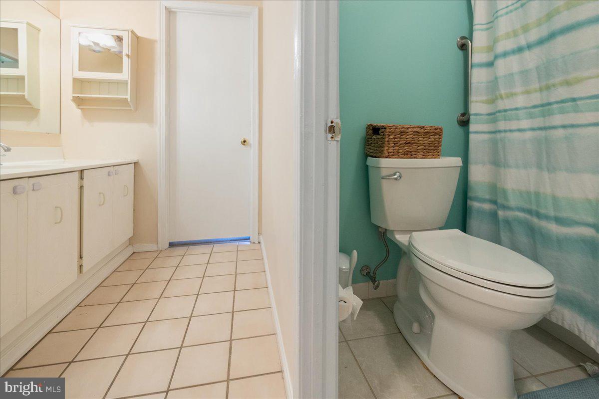 4639 Sands Way Doylestown, PA 18902 - Photo 20 of 32 a bathroom with a toilet and a shower
