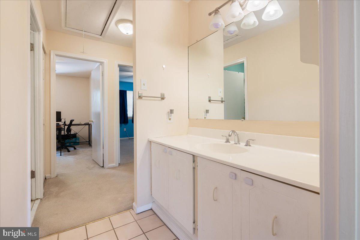 4639 Sands Way Doylestown, PA 18902 - Photo 28 of 32 a spacious bathroom with a sink a mirror and a shower