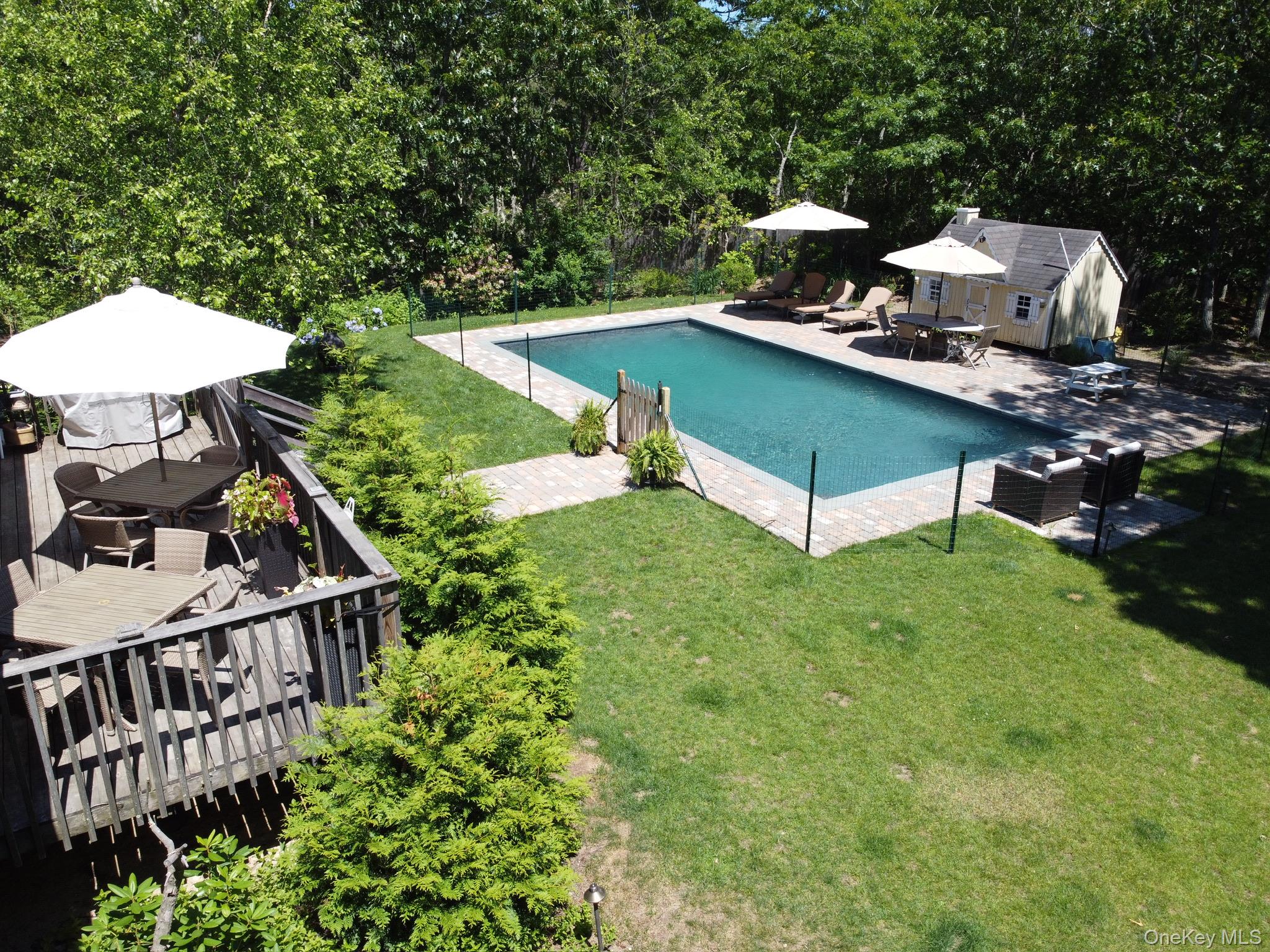 28 Old Trail Road Water Mill, NY 11976 - Photo 3 of 25 a view of a house with backyard entertaining space and deck