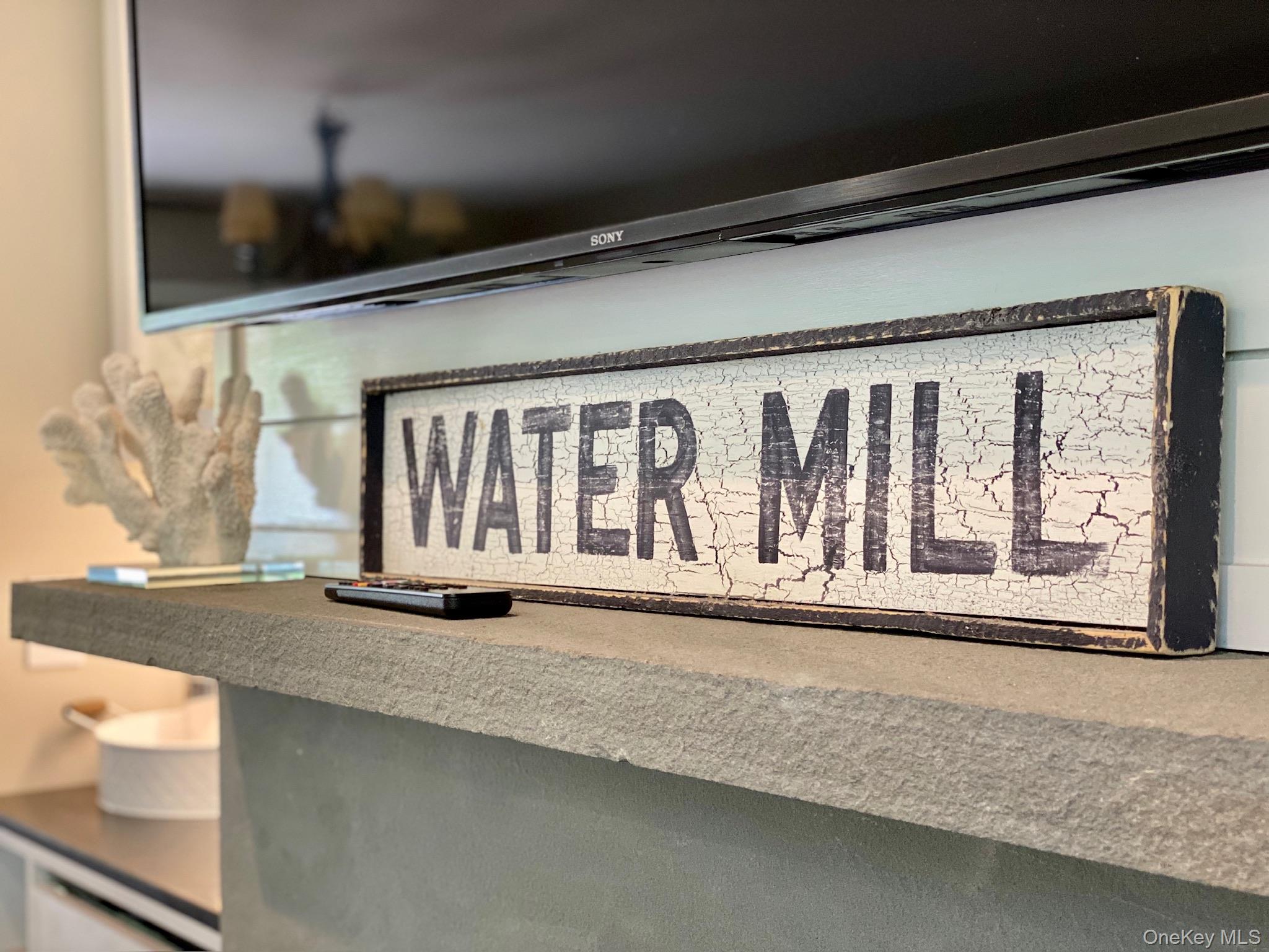 28 Old Trail Road Water Mill, NY 11976 - Photo 10 of 25 a blue white and white kitchen with sink