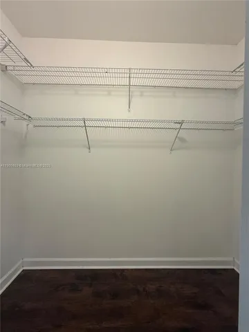 a view of a room with racks on the wall