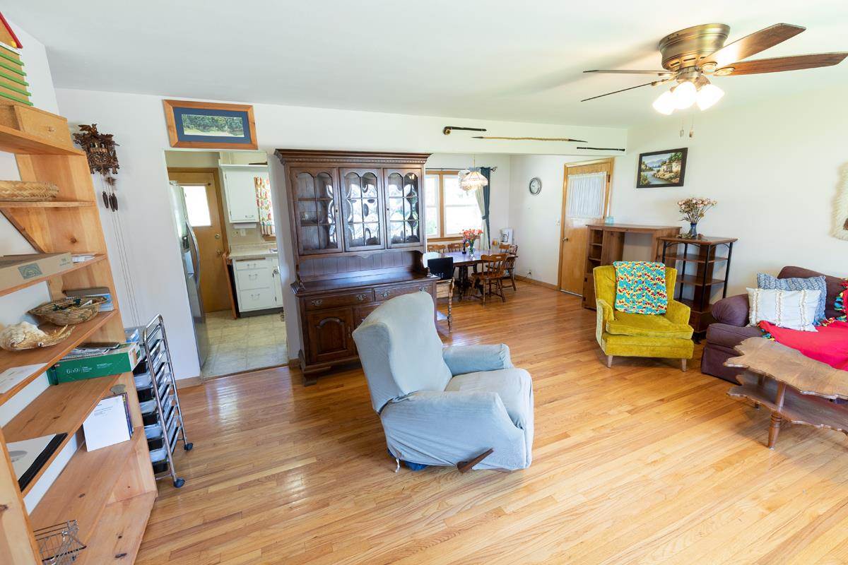 357 Phyllis Avenue Rochelle, IL 61068 - Photo 3 of 18 a living room with furniture and wooden floor