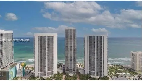 a view of a city with tall buildings