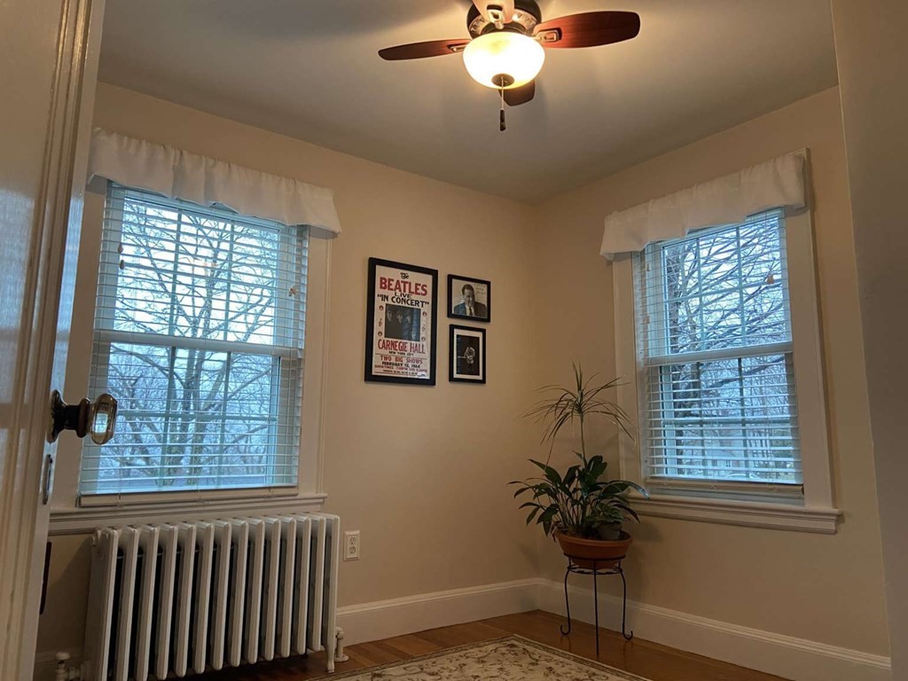 52 Governor Long Road Hingham, MA 02043 - Photo 12 of 19 a view of a room with a window and chandelier