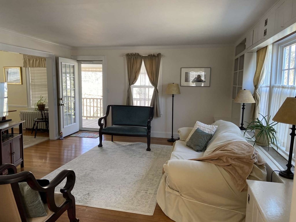 52 Governor Long Road Hingham, MA 02043 - Photo 7 of 19 a living room with furniture and a window