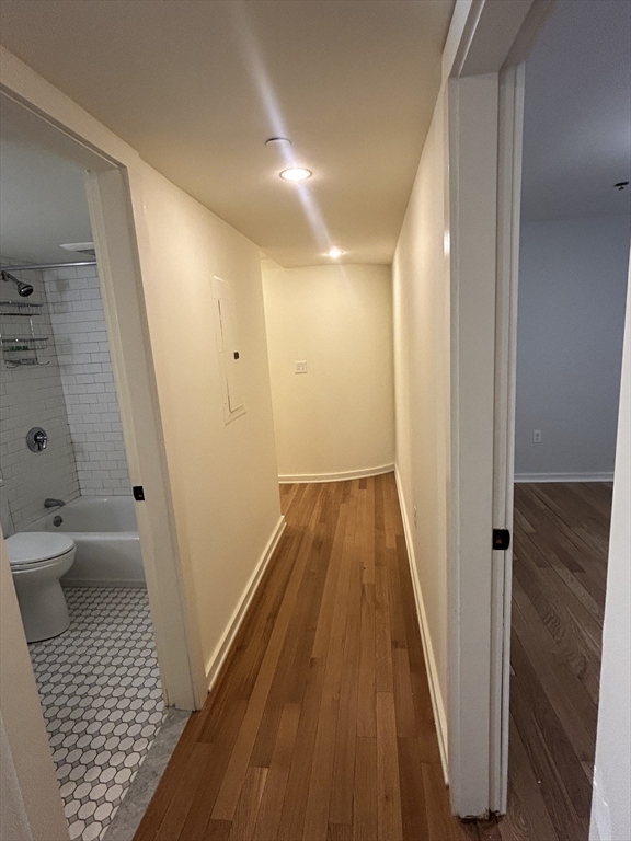 10 Linwood Street, Unit 1 Boston, MA 02119 - Photo 3 of 11 a bathroom with a sink and toilet