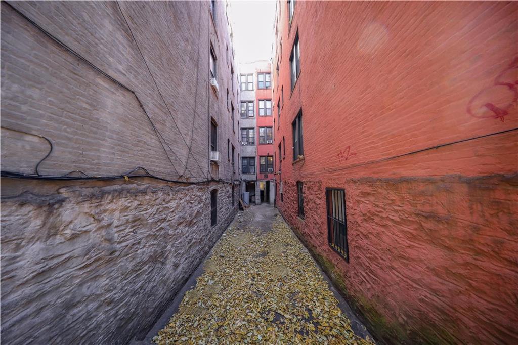 622 Marlborough Road Brooklyn, NY 11226 - Photo 19 of 32 a view of a pathway both side of house