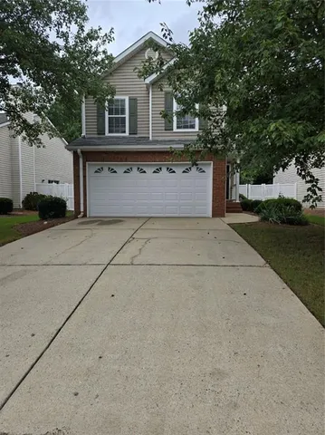 a house view with a outdoor space