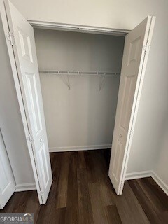 122 Saine Drive Southwest, Unit 307 Marietta, GA 30008 - Photo 18 of 22 a view of front door with wooden floor