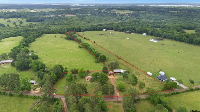 a view of a lake with a yard