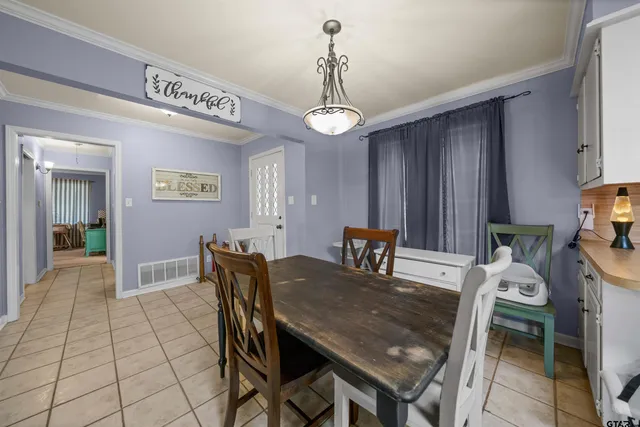 a view of a dining room with furniture