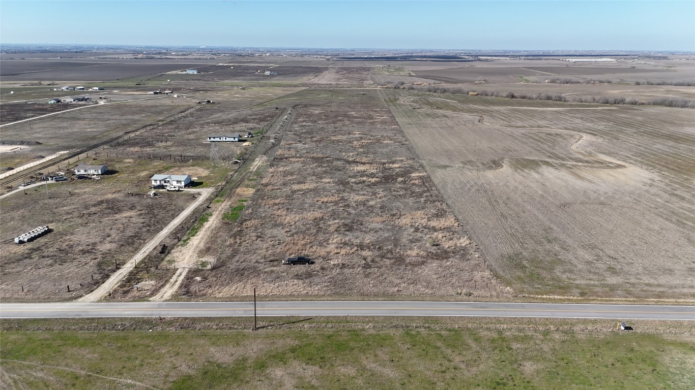 16024 Wells Road Manor, TX 78653 - Photo 3 of 14 a view of a yard