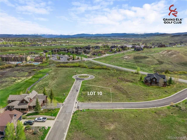 a view of a swimming pool with a garden