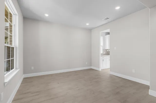 an empty room with windows