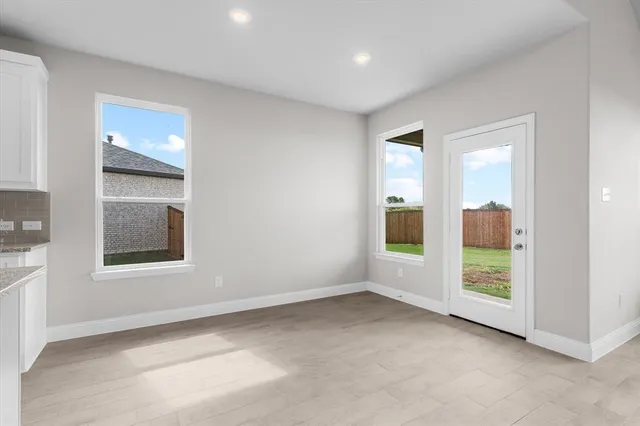 an empty room with windows