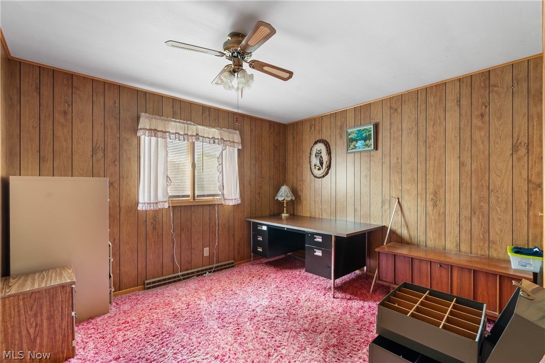 22840 Buck Road Alliance, OH 44601 - Photo 16 of 36 Office featuring ceiling fan, light carpet, and wood walls