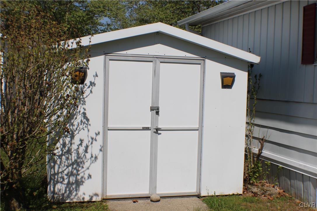 7 Springridge Road Bath, PA 18014 - Photo 3 of 17 a front view of a house with a yard